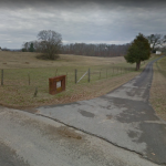 Road entrance to the cemetery