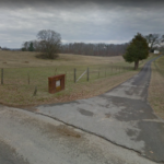 Road entrance to the cemetery