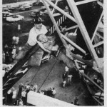 Dean photo of man in crane.