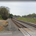 Railroad with train approaching