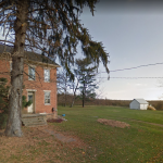 This is an old home in the Latimore area that is similar to that which was in the event: a brick house, a shed, a wooded area, a back road. Home in Latimore area