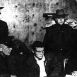 Wells Jr. taken in for questioning in Hawthorne, NY for arson and murder. He changed his story three times (1955). Wells Jr. taken in for questioning 1955